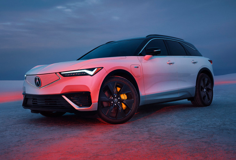 Acura ZDX parked on the salt flats at dusk