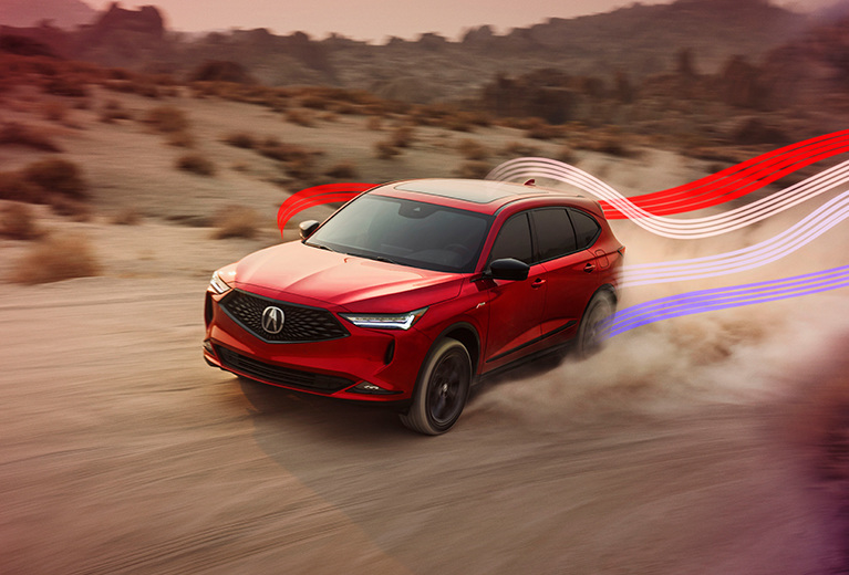 MDX with A-Spec® Package in Performance Red Pearl driving on a highway with color light streaks